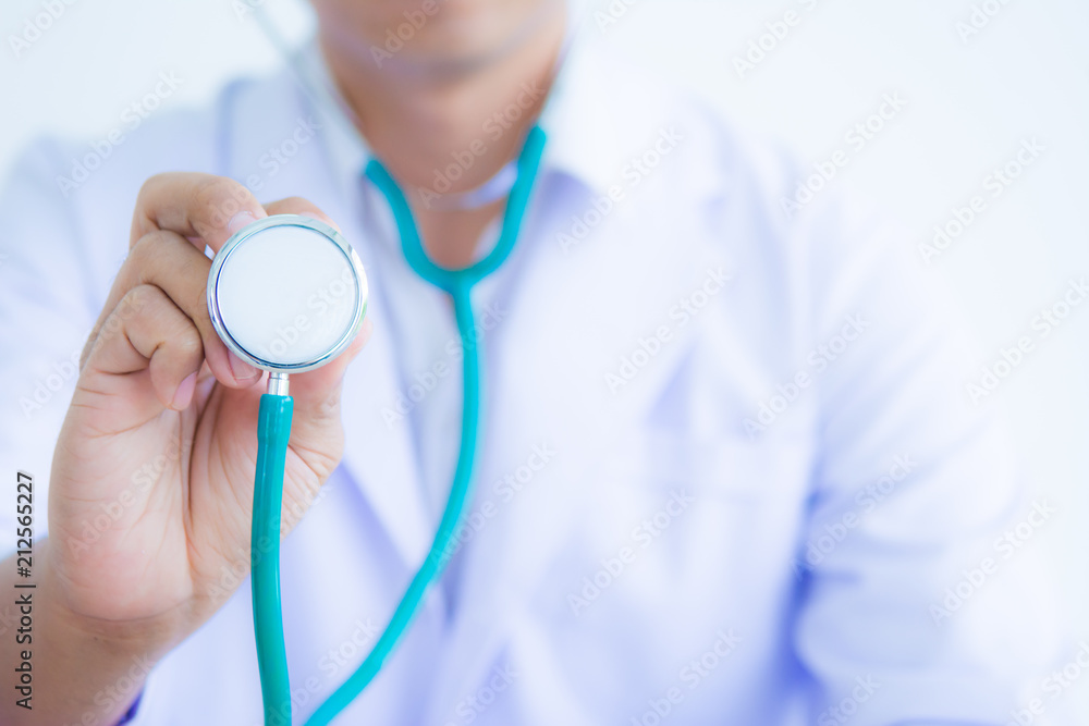 Doctor in white coat with stethoscope on white background for health care concept Doctor in white coat with stethoscope on white background for health care concept