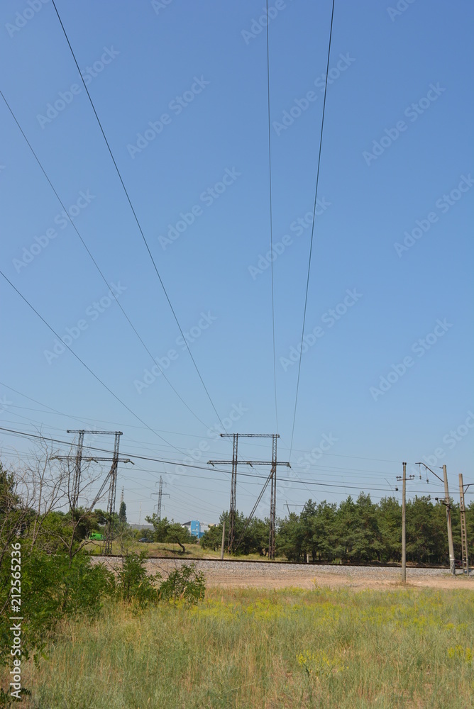 Blue sky with black electrical wires, city electricity, power lines