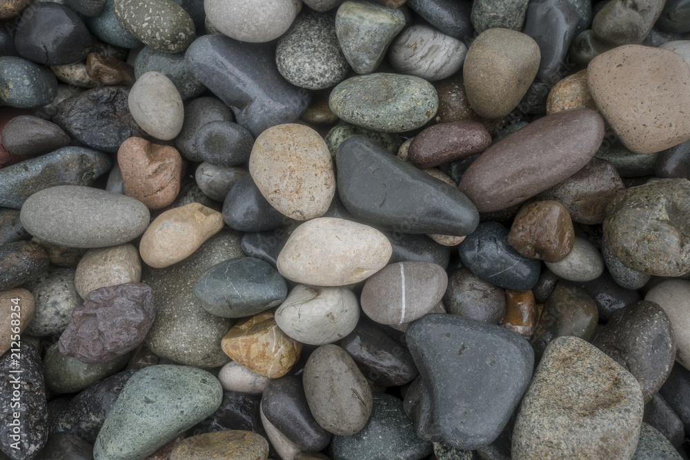 wet pebble on beach abstract pattern texture background wet pebble on beach abstract pattern texture background