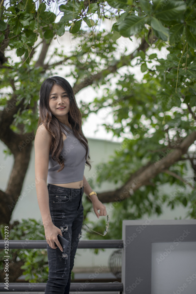Asian women smile happily. Asian women smile happily.