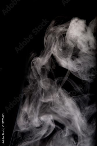 White smoke isolated on black background.