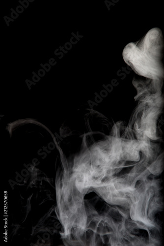 White smoke isolated on black background.
