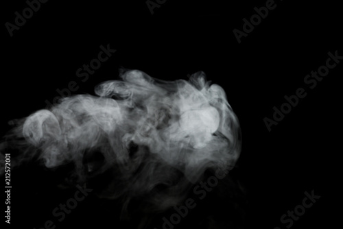 White smoke isolated on black background.