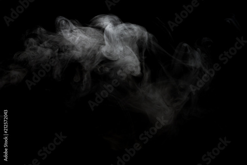White smoke isolated on black background.