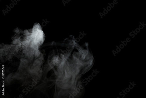 White smoke isolated on black background.