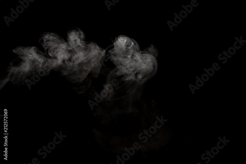 White smoke isolated on black background.