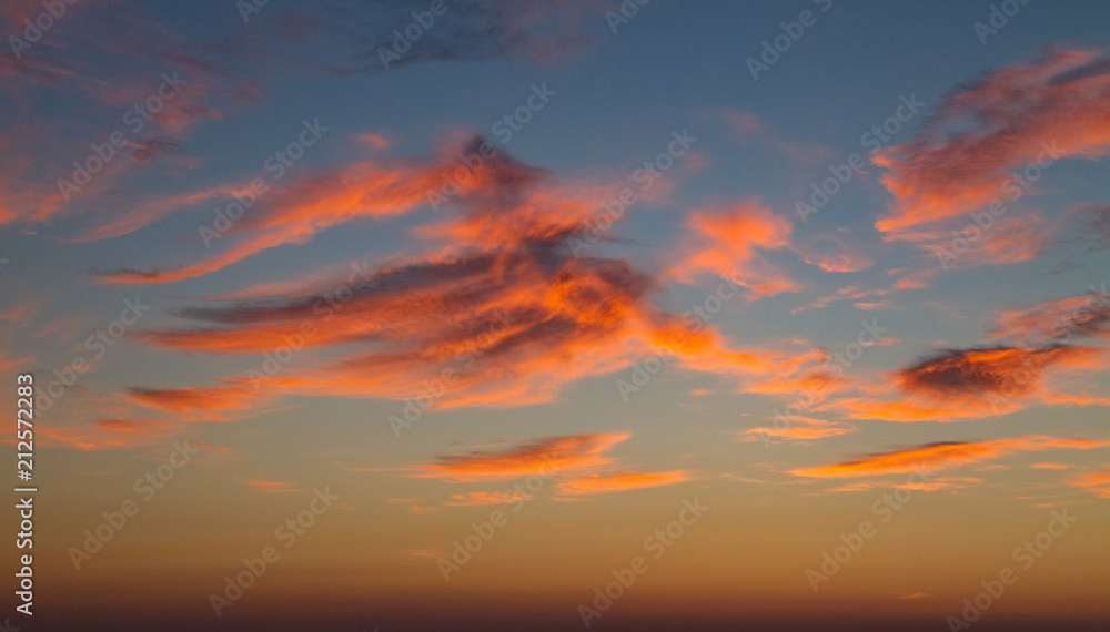 Orange glow cloudscape sky abstract at sunset