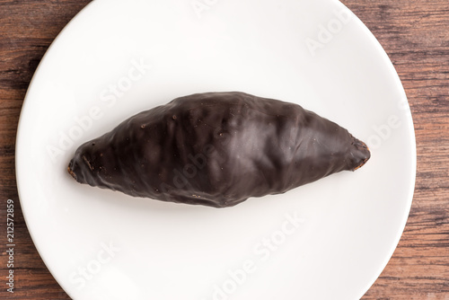 chocolate croissant on white plate