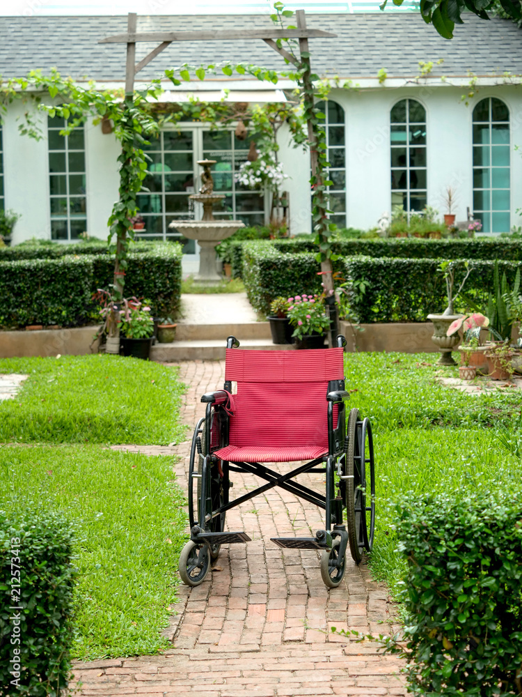 Empty wheelchair in the home garden.