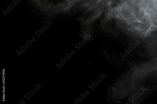 White smoke isolated on black background.