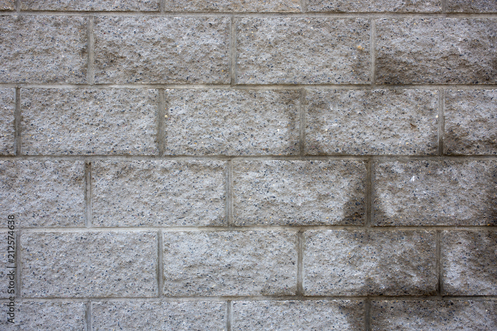 Naklejka premium stone tiles on the wall pattern texture background