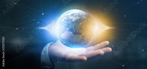 Businessman holding a 3d rendering particles earth globe