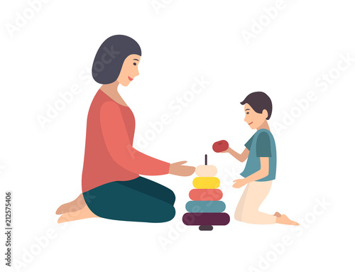 Mom and son sitting on floor and building pyramid together. Mother teaching her little boy to play with toy. Funny cartoon characters isolated on white background. Flat colored vector illustration.