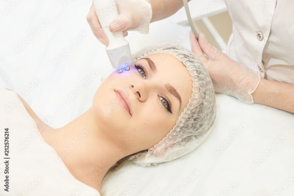 Dermatology treatment in cosmetology clinic. Woman and doctor. Skin procedure Dermatology treatment in cosmetology clinic. Woman and doctor. Skin procedure