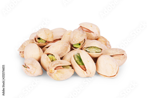 Heap of pistachios nuts on a white background