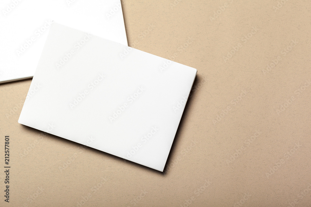 Blank paper pieces for mock up on a beige background Blank paper pieces for mock up on a beige background