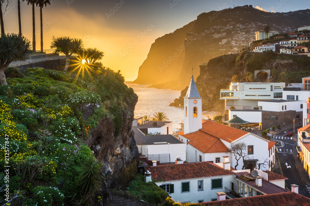 Sunset over the church in Camara de Lobos, Madeira, Portugal