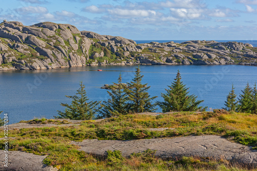 Magnificent view on the sea and stony coast of the Eigeroya island in Eigersund Municipality, southwest Norway photo