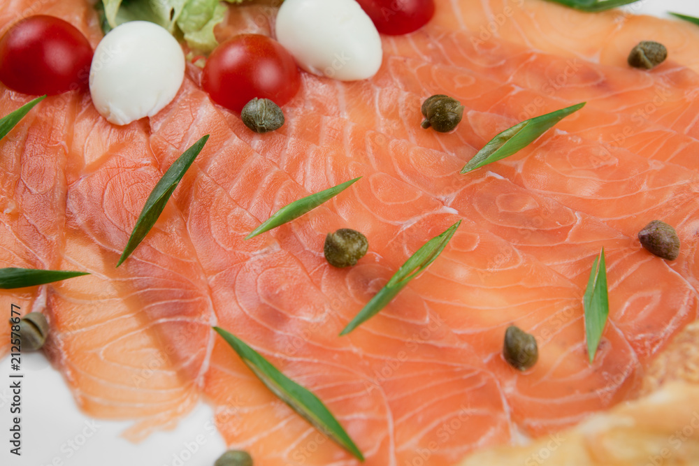 Photo of a plate wih smocked salmon homemade.