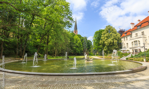 Olsztyn  northern Poland. Fountain in City Park on  Lyna River