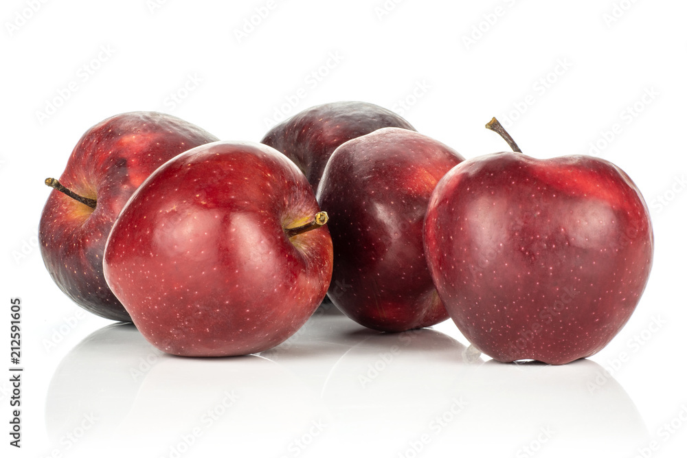 Fototapeta premium Five red delicious apples isolated on white background.