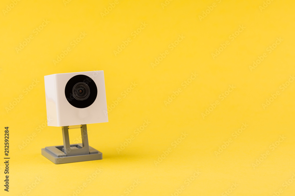 webcam white on a yellow background, object, Internet, technology concept