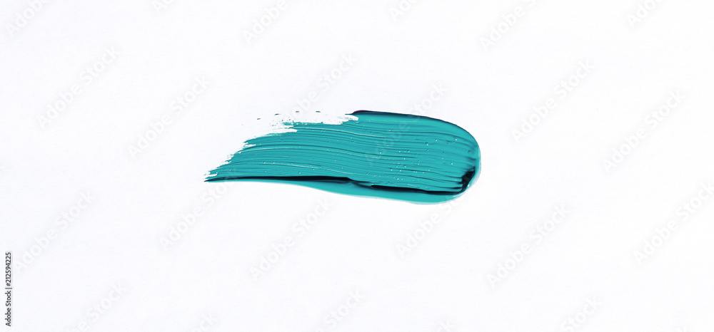 Fototapeta premium Turquoise brush stroke isolated over white background