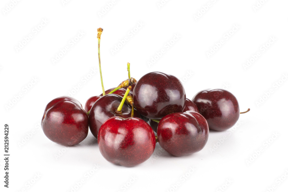Sweet bright red cherry stack isolated on white........................................................................... Sweet bright red cherry stack isolated on white...........................................................................