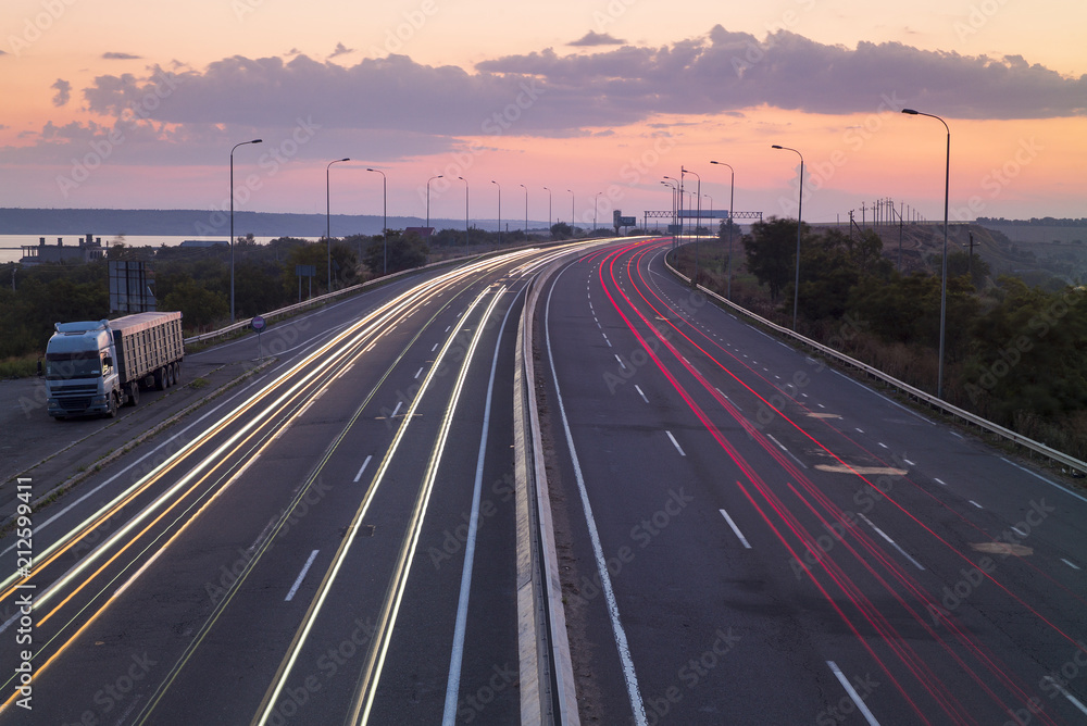 car trails with truck on the road in Ukraine