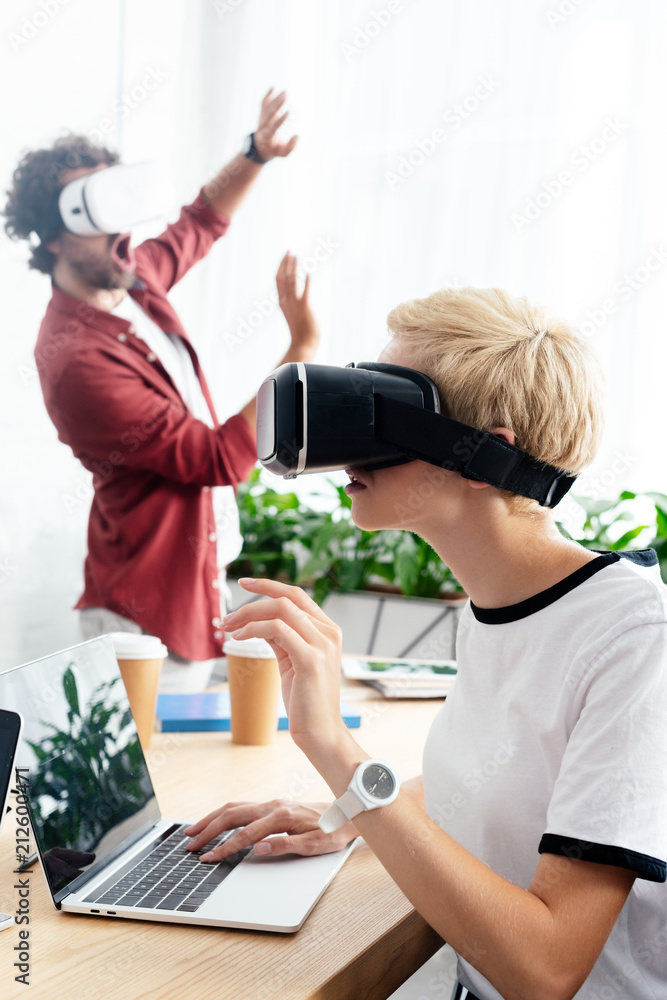 Fototapeta premium young start up team using virtual reality headsets and working in office