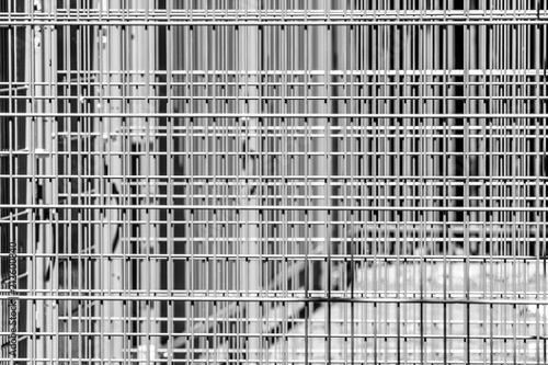 Принти на полотні Abstract austere geometric pattern of iron bars, several barriers in front of a