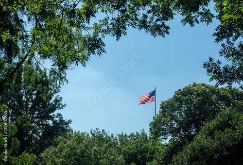USA stars and stripes flag against blue sky