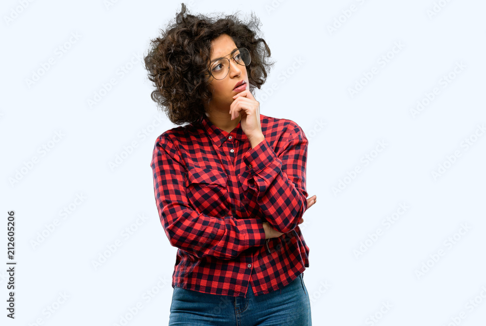 Beautiful arab woman doubt expression, confuse and wonder concept, uncertain future Beautiful arab woman doubt expression, confuse and wonder concept, uncertain future
