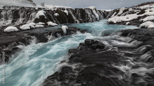 Blue Bruarfoss waterfall in winter in Iceland