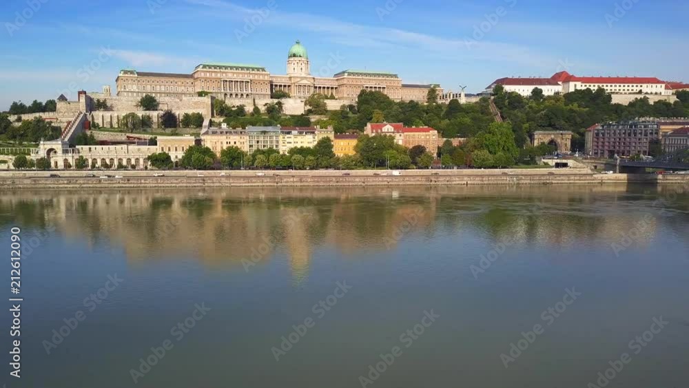 Budapest, Hungary - 4K flying above Szechenyi Chain Bridge with busy morning traffic at sunrise. Fisherman's Bastion and Buda Castle Royal Palace at background Budapest, Hungary - 4K flying above Szechenyi Chain Bridge with busy morning traffic at sunrise. Fisherman's Bastion and Buda Castle Royal Palace at background
