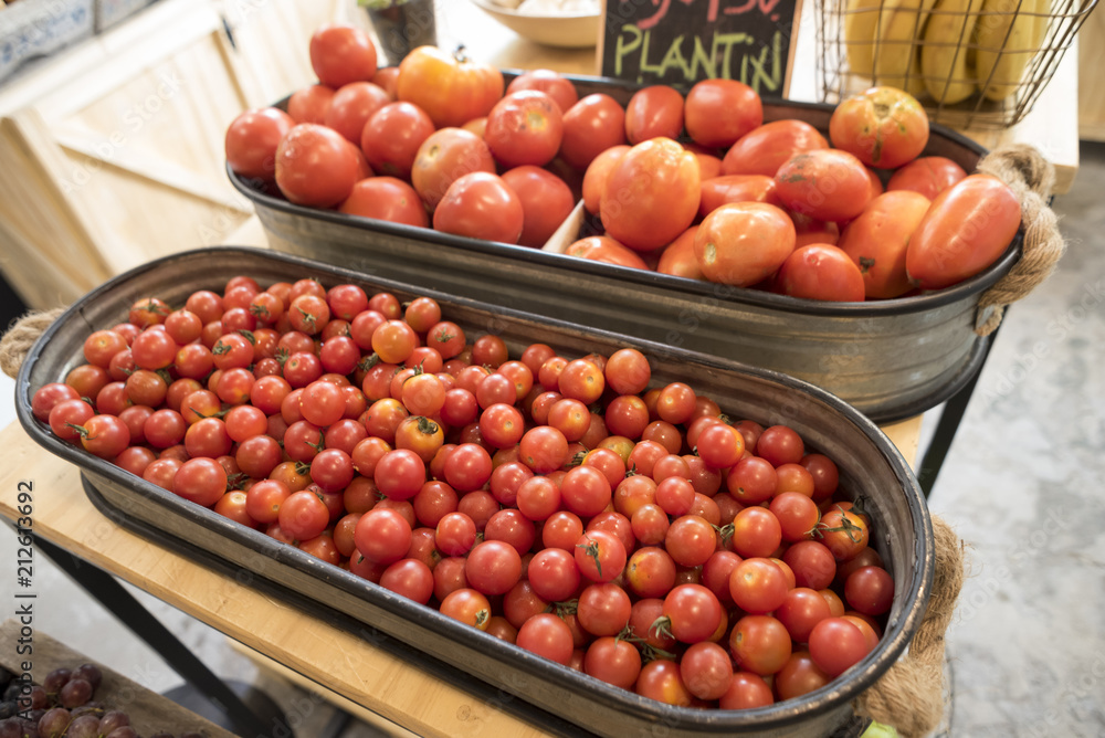 Red tomatoes at organic food market for sale Red tomatoes at organic food market for sale