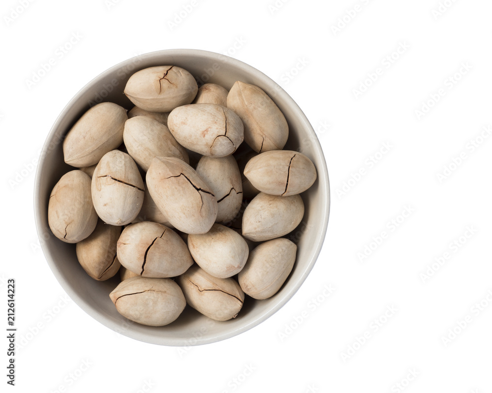 Full bowl of pecan nuts in shell, isolated on white background. Full bowl of pecan nuts in shell, isolated on white background.
