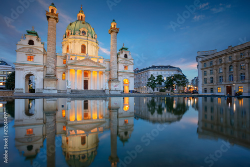 Vienna. Cityscape image of Vienna with St. Charles Church during twilight blue hour. photo