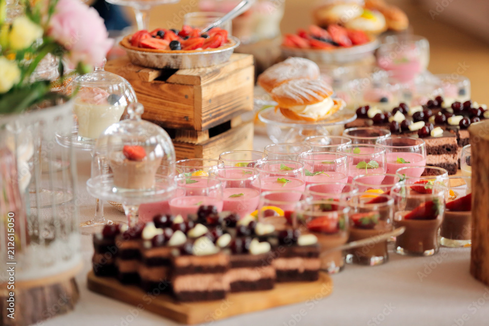 Catering sweets, closeup of various kinds of fruit pastry on event or wedding reception