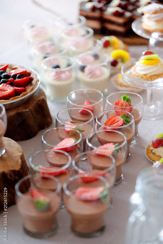 Catering sweets, closeup of various kinds of fruit pastry on event or wedding reception Catering sweets, closeup of various kinds of fruit pastry on event or wedding reception