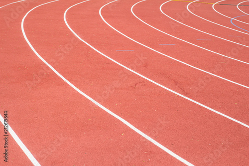 All-weather running track , orange and white lanes for running training