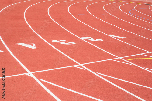 All-weather running track , orange and white lanes for running training