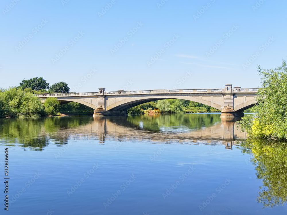 Cloudless summer morning at Gunthorpe Bridge on the River Trent in Nottinghamshire Cloudless summer morning at Gunthorpe Bridge on the River Trent in Nottinghamshire