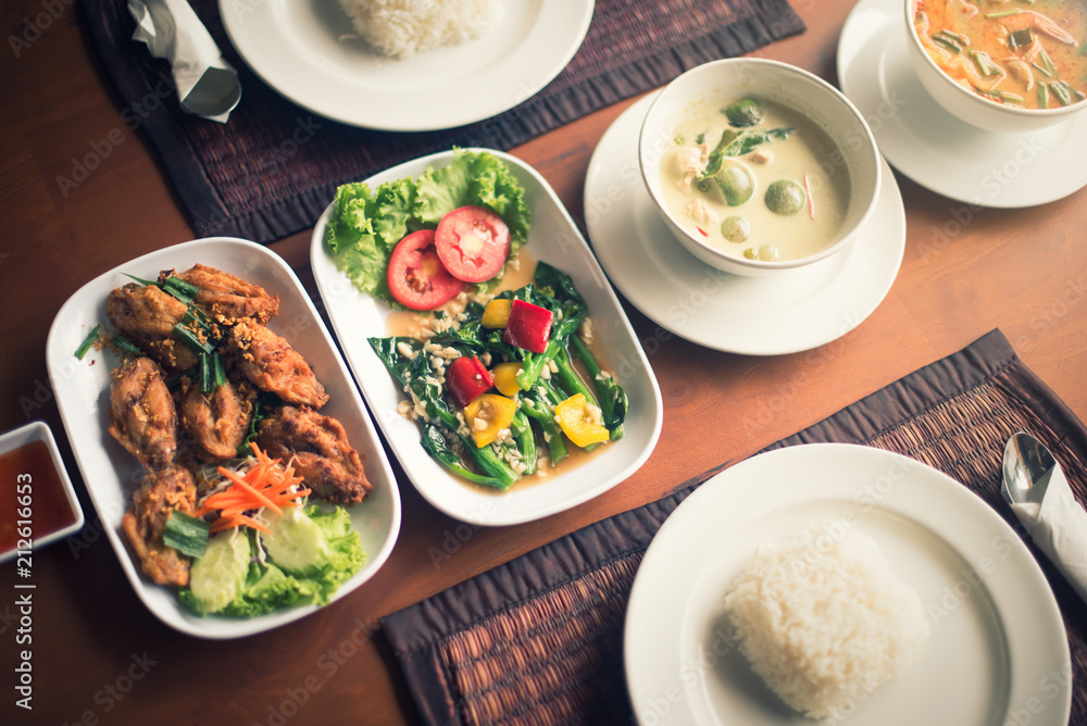 Set of thai food popular menu on wooden table in the restaurant