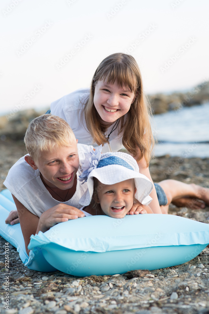 Three children on the beach Three children on the beach