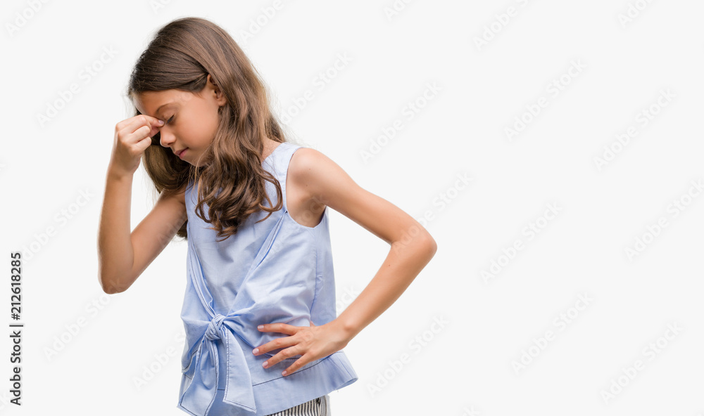 Brunette hispanic girl tired rubbing nose and eyes feeling fatigue and headache. Stress and frustration concept. Brunette hispanic girl tired rubbing nose and eyes feeling fatigue and headache. Stress and frustration concept.