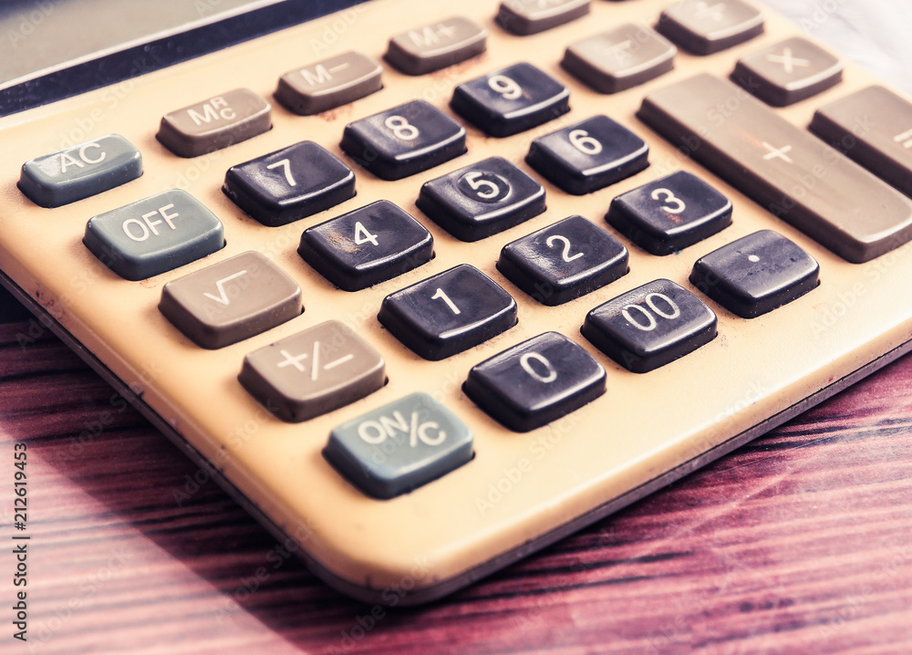Older versions of the calculator. Selective focus and close up macro shot. Older versions of the calculator. Selective focus and close up macro shot.