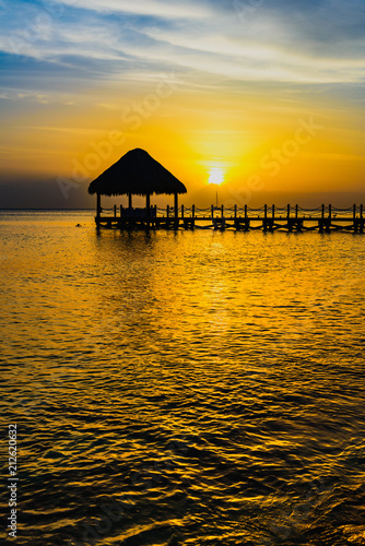 sun sea tropical sunset view of the pier of the caribbean
