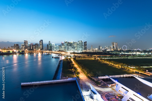 singapore skyline in evening time, view from open deck of a cruise ship