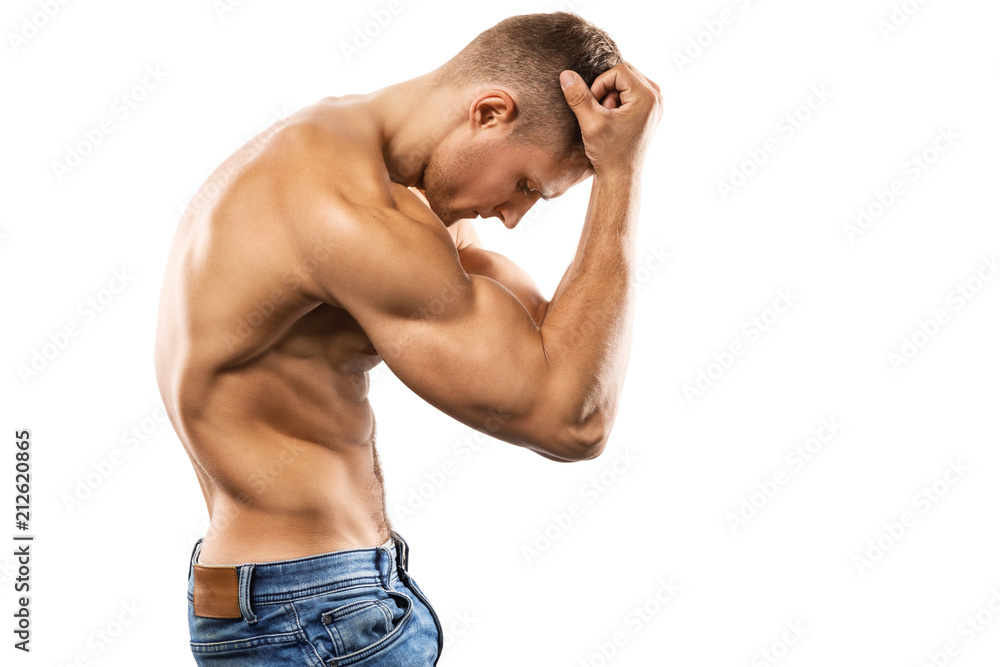 Fototapeta premium Young muscular fitness model with beautiful aesthetic body